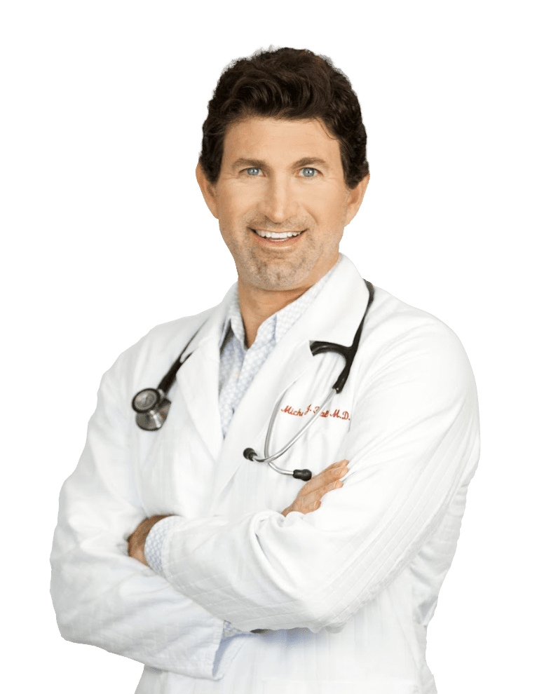 Portrait of Dr. M. Hall in a white lab coat with arms crossed